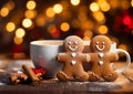 Gingerbread men with a hot chocolate on a cozy Christmas lights blur background Royalty Free Stock Photo