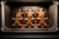 Delicious fresh baked gingerbread men in the oven Royalty Free Stock Photo