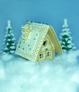 The gingerbread in snow with blue background Royalty Free Stock Photo