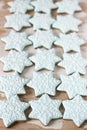 Gingerbread star cookie for Christmas on white background. Royalty Free Stock Photo