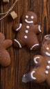 Gingerbreadman on brown wooden background