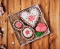 Gingerbreads in gift box on a wooden background