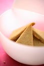 Gingerbreads in white plastic bowl Royalty Free Stock Photo
