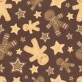 Gingerbread men on a brown background. Christmas seamless pattern with gingerbread men Royalty Free Stock Photo