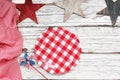 Gingham Picnic Blanket and Plate with Stars Background Royalty Free Stock Photo