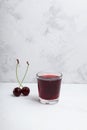 Ginjinha or Ginja. Portuguese liqueur made by infusing ginja berries sour cherry, Prunus cerasus austera, Morello cherry in Royalty Free Stock Photo