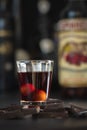 Ginjinha liquor in small glass on table