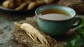 Ginseng root and a cup of herbal tea Royalty Free Stock Photo