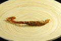 Ginseng roots on a wooden plate. Chinese medicine