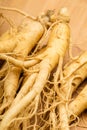 Ginseng with wooden background Royalty Free Stock Photo