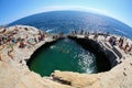 GIOLA, THASSOS, GREECE - AUGUST 2015: Tourists bathing in the Giola. Giola is a natural pool in Thassos island, Septeber 2017