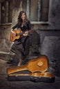 Gipsy girl playing guitar Royalty Free Stock Photo