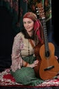 The gipsy with a guitar Royalty Free Stock Photo