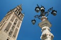 Giralda belfry and streetlight in Seville Royalty Free Stock Photo