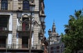 The Giralda, the bell tower of the Cathedral of Seville and traditional lamp post in the foregrond, Seville, Spain