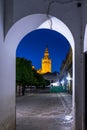 The Giralda bell tower lit up at night in Seville, Spain, Europe Royalty Free Stock Photo