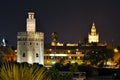 Giralda and Tower of Gold at night, Seville, Spain Royalty Free Stock Photo