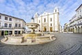 Giraldo Square with fountain and Saint Anton`s church, Evora, Al