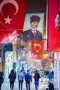 Giresun, Turkey - May 5, 2017. Crowdy Main Street at night with Turkish flag and poster of ex-president Ataturk