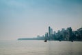 Girgaon Chowpatty beach and modern buildings in Mumbai, India