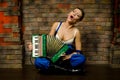The girl with an accordion Royalty Free Stock Photo