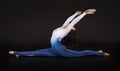 Girl acrobat, gymnastics, a young athlete in a blue and white suit , practicing acrobatics. images on white background