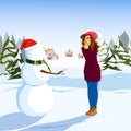 The girl admires the snowman in sunny winter day