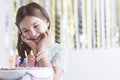 Girl admiring birthday cake