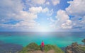 Girl admiring the Cornish coast