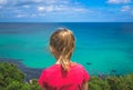 Girl admiring the Cornish coast