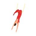 Girl aerialist in red costume hanging in air during performance in circus