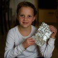 Girl with Afikoman is a half-piece of matzah which is broken of the Passover Seder.