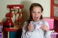 Girl with Afikoman is a half-piece of matzah which is broken of the Passover Seder.