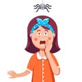 Girl afraid of a spider hanging from the top Royalty Free Stock Photo