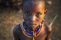 Girl from the african tribe Dassanech poses for a portrait, Mago National Park Royalty Free Stock Photo