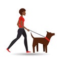 Girl afro walking a brown dog Royalty Free Stock Photo