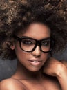 Girl with afro wearing eyeglasses. Royalty Free Stock Photo