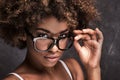 Girl with afro wearing eyeglasses. Royalty Free Stock Photo