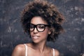 Girl with afro wearing eyeglasses. Royalty Free Stock Photo