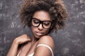 Girl with afro wearing eyeglasses. Royalty Free Stock Photo