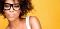 Girl with afro wearing eyeglasses, portrait. Royalty Free Stock Photo
