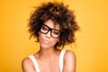 Girl with afro wearing eyeglasses, portrait. Royalty Free Stock Photo