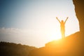 Girl against sun on mountain Royalty Free Stock Photo