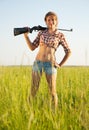 Girl with air rifle Royalty Free Stock Photo