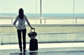 Girl at the airport window Royalty Free Stock Photo