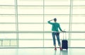 Girl at the airport window Royalty Free Stock Photo