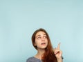 Girl amazed point finger advertising space above Royalty Free Stock Photo