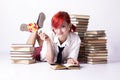 The girl in anime style with candy and books Royalty Free Stock Photo