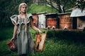 The girl on an apiary Royalty Free Stock Photo