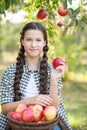 Girl with Apple in the Apple Orchard